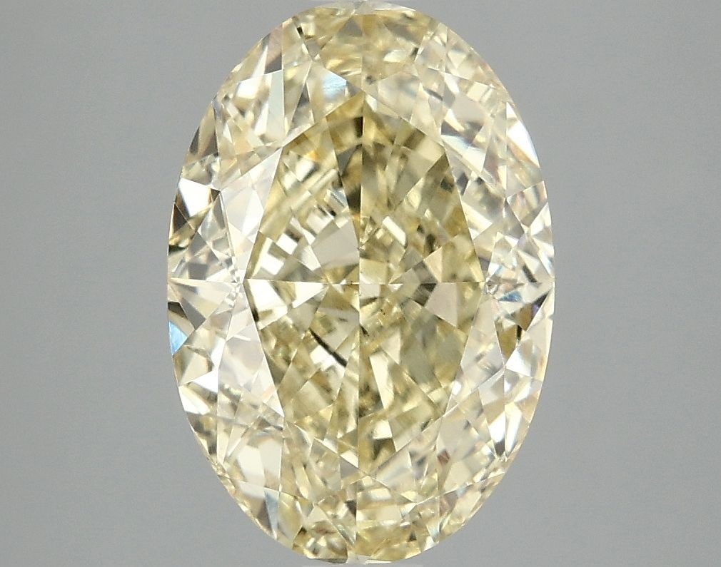 Loose Diamond - OVAL 4.05ct Fancy Vivid Yellow VS2: Loose Diamond - OVAL 4.05ct Fancy Vivid Yellow VS2 Source: This is a real non-mined Diamond that has been grown in a lab Shape: OVAL Carats: 4.05 Color: Fancy Vivid Yellow Certification: IGI Video: