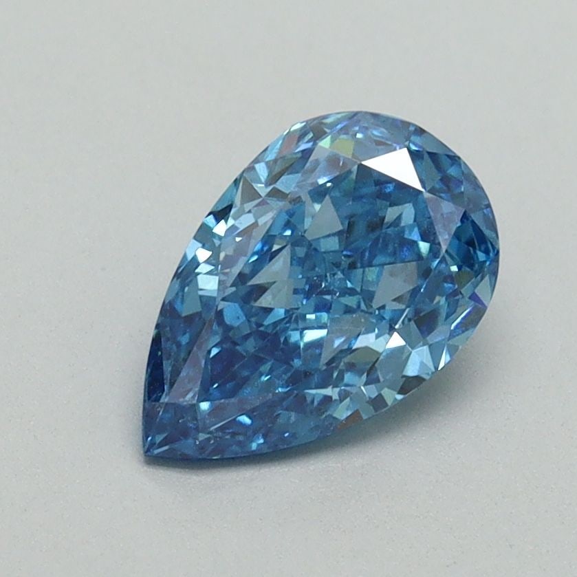 Loose Diamond - PEAR 1.08ct Fancy Vivid Blue VS2: Loose Diamond - PEAR 1.08ct Fancy Vivid Blue VS2 Source: This is a real non-mined Diamond that has been grown in a lab Shape: PEAR Carats: 1.08 Color: Fancy Vivid Blue Certification: IGI Video: