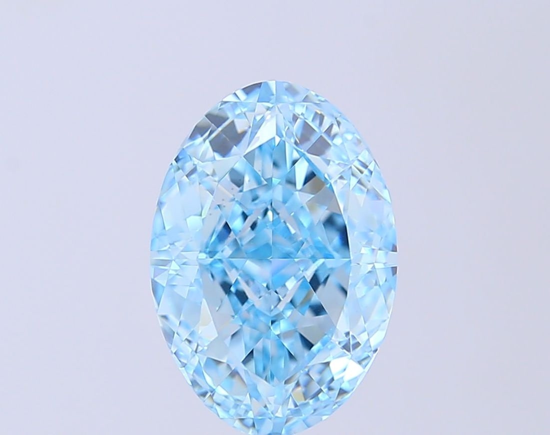Loose Diamond - OVAL 5.07ct Fancy Vivid Blue VVS2: Loose Diamond - OVAL 5.07ct Fancy Vivid Blue VVS2 Source: This is a real non-mined Diamond that has been grown in a lab Shape: OVAL Carats: 5.07 Color: Fancy Vivid Blue Certification: IGI Video: