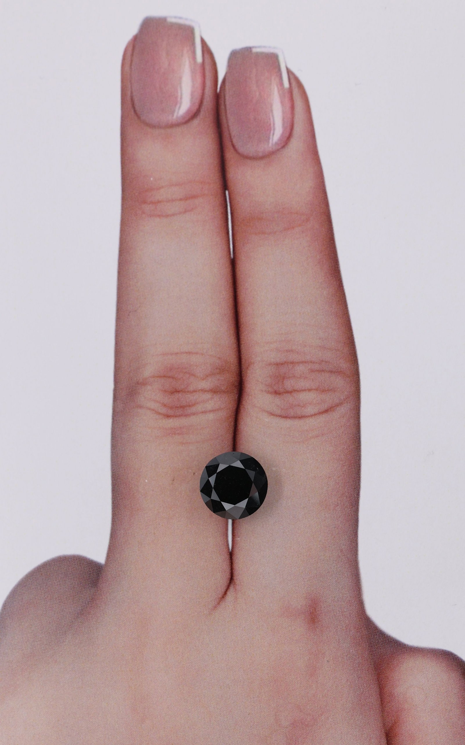 Loose Diamond - ROUND 2.49ct Black: Loose Diamond - ROUND 2.49ct Black Source: Natural Shape: ROUND Carats: 2.49 Color: Black Certification: IGI Video: