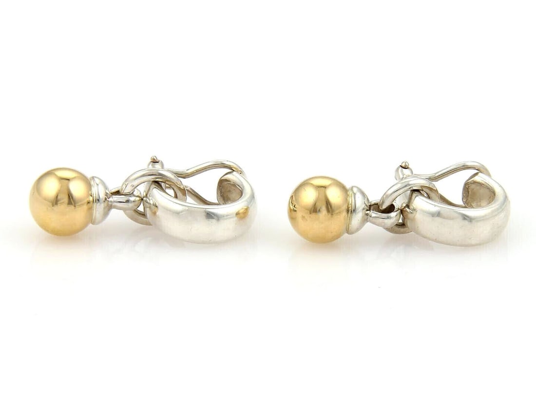 Tiffany & Co. Fascination hoop dangle earrings sterling silver 18k gold ball: Tiffany & Co. Fascination hoop dangle earrings sterling silver 18k gold ball Pre-owned Tiffany & Co. Fascination hoop dangle earrings in sterling silver with 18k yellow gold ball drops. This two-tone 