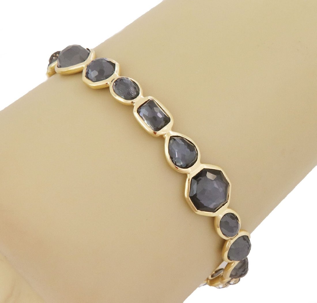 IPPOLITA Rock Candy Gelato 18k Yellow Gold Quartz Bangle Bracelet: IPPOLITA Rock Candy Gelato 18k Yellow Gold Quartz Bangle Bracelet Pre-owned Ippolita Rock Candy Gelato bangle bracelet crafted in 18k yellow gold with natural quartz in a polished bezel-set design. Th