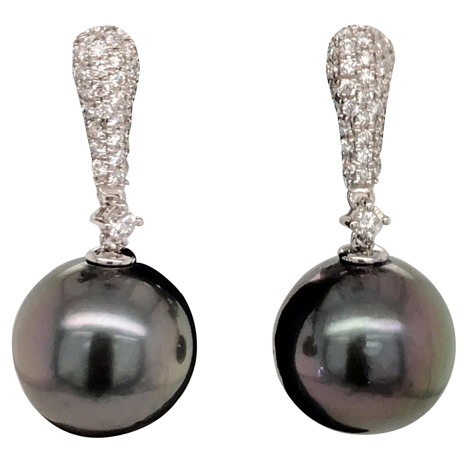 18K White Gold Tahitian Pearl Drop Earrings with 0.37 Carat Diamonds: 18K White Gold Tahitian Pearl Drop Earrings with 0.37 Carat Diamonds Contemporary drop earrings in 18 karat white gold, featuring two Tahitian pearls accented by 68 round brilliant diamonds. The diamo