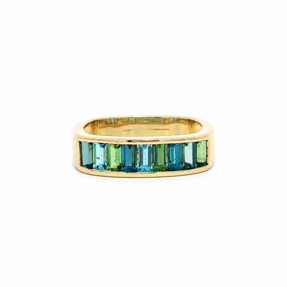 14k Yellow Gold Band Ring with Aquamarine and Peridot Size 6.5: 14k Yellow Gold Band Ring with Aquamarine and Peridot Size 6.5 Pre-owned women's band ring crafted in solid 14k yellow gold, featuring channel-set natural aquamarine and peridot baguette-cut stones in