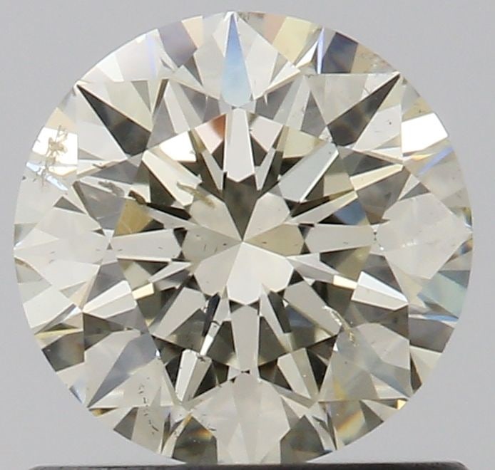Loose Diamond - ROUND 0.72ct M SI2: Loose Diamond - ROUND 0.72ct M SI2 Source: Natural Shape: ROUND Carats: 0.72 Color: M Clarity: SI2 Certification: GIA Video: