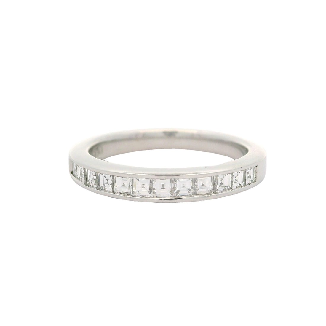 Blue Nile Platinum 0.60ctw Channel Set Diamond Wedding Band Ring: Blue Nile Platinum 0.60ctw Channel Set Diamond Wedding Band Ring This exquisite wedding band features a channel set design adorned with twelve natural genuine diamonds, each cut in a square step (carr