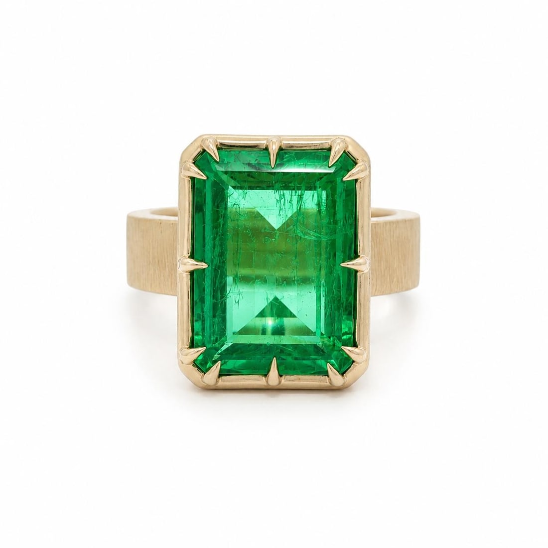 AGL Certified 8.11ct Colombian Emerald Solitaire Ring in 18k Yellow Gold: AGL Certified 8.11ct Colombian Emerald Solitaire Ring in 18k Yellow Gold Vintage natural Colombian emerald solitaire ring set in solid 18k yellow gold with a brushed finish. The ring features one rect