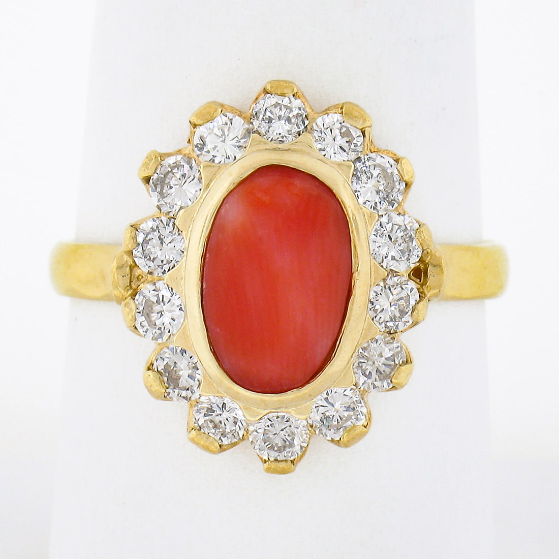 Vintage 18K Yellow Gold Coral Diamond Halo Flower Ring Size 8: Vintage 18K Yellow Gold Coral Diamond Halo Flower Ring Size 8 Vintage fine ring crafted in solid 18k yellow gold, featuring an oval cabochon natural orangey-red coral at the center of a diamond halo i