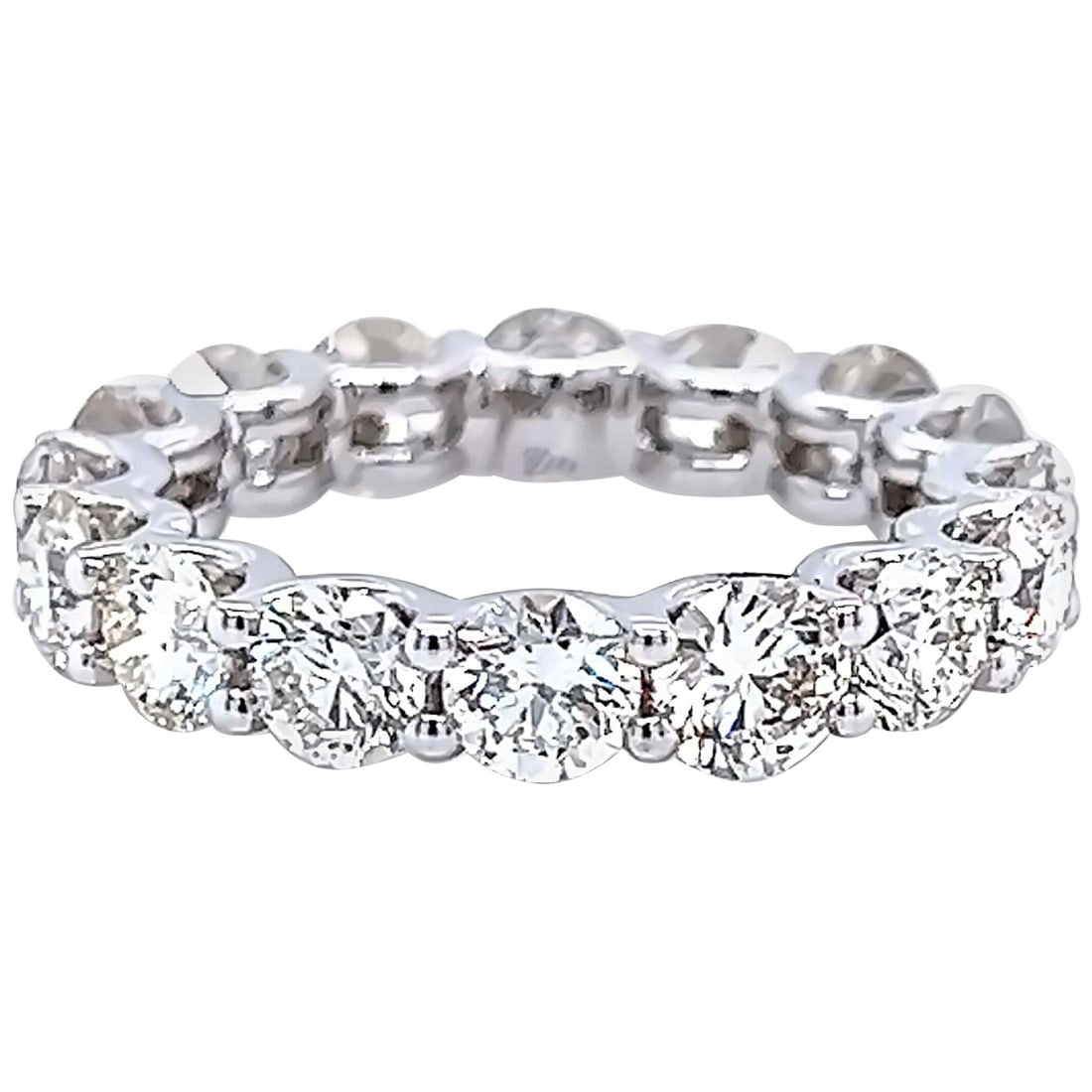 18k White Gold Diamond Eternity Ring 4.21ct Size 5.5: 18k White Gold Diamond Eternity Ring 4.21ct Size 5.5 Timeless diamond eternity band featuring 16 round brilliant diamonds with a total weight of 4.21 ct, U-prong set in 18k white gold. Contemporary in
