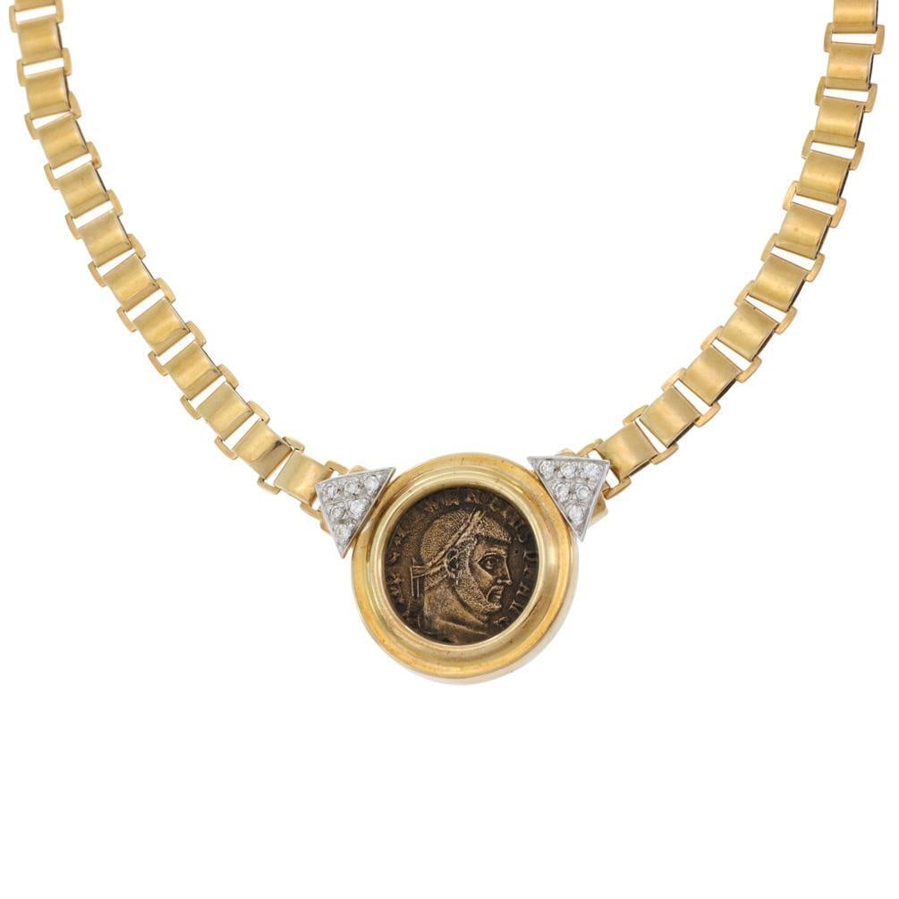 14k Yellow Gold Necklace with Roman Bronze Coin Diamond Pendant: 14k Yellow Gold Necklace with Roman Bronze Coin Diamond Pendant This vintage-style necklace features a stunning combination of 14k yellow gold and an ancient bronze Roman coin. The pendant showcases a