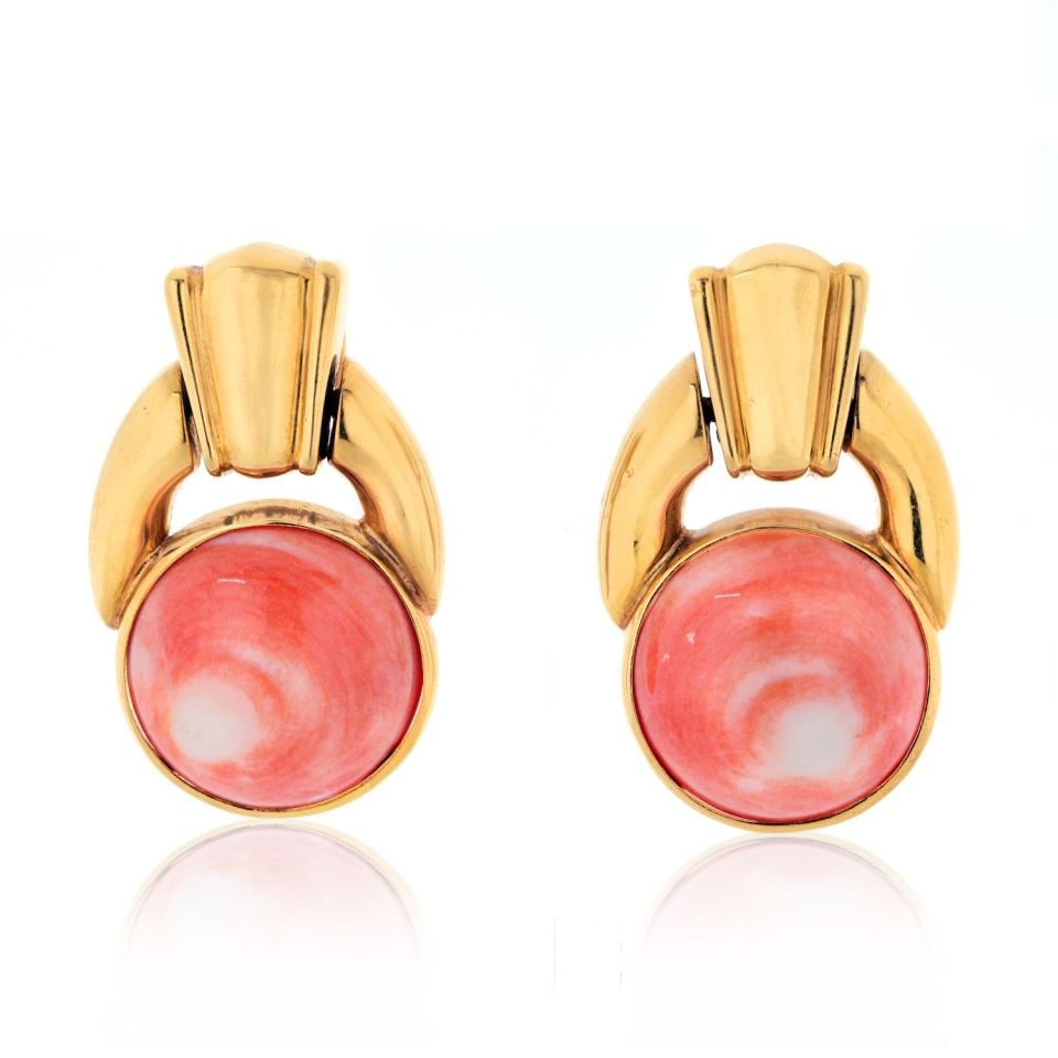 David Webb Coral Doorknocker Earrings in Platinum and 18K Yellow Gold: David Webb Coral Doorknocker Earrings in Platinum and 18K Yellow Gold A pre-owned pair of David Webb earrings featuring a button doorknocker design with coral, crafted in platinum and 18K yellow gold.