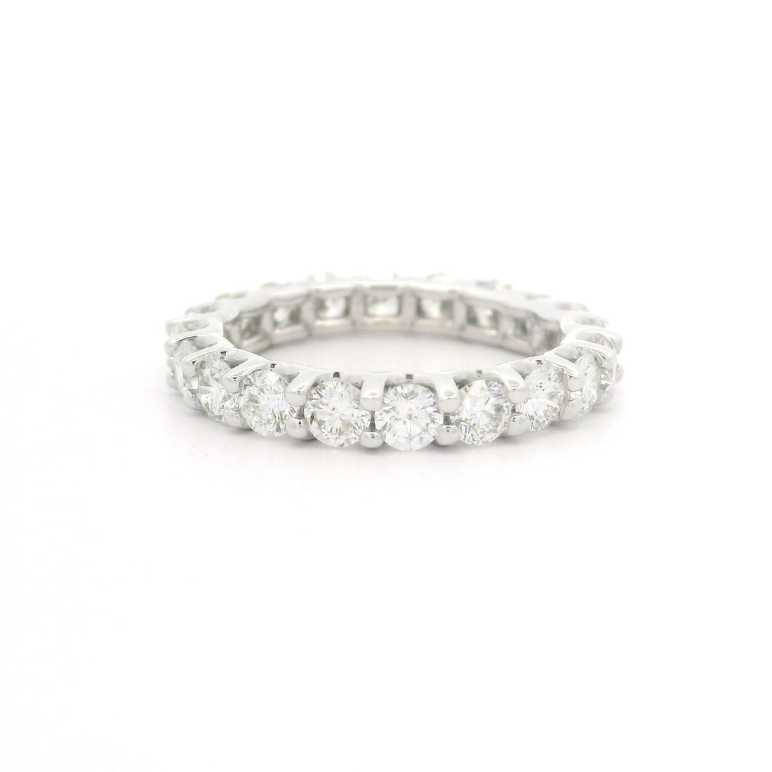 14k White Gold 1.80ctw Round Diamond Eternity Band Ring: 14k White Gold 1.80ctw Round Diamond Eternity Band Ring This stunning eternity band ring features 20 natural round brilliant cut diamonds, meticulously set in a shared prong design. Crafted from solid