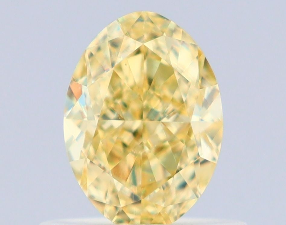 Loose Diamond - OVAL 0.71ct Fancy Yellow VS2: Loose Diamond - OVAL 0.71ct Fancy Yellow VS2 Source: Natural Shape: OVAL Carats: 0.71 Color: Fancy Yellow Certification: GIA Video: