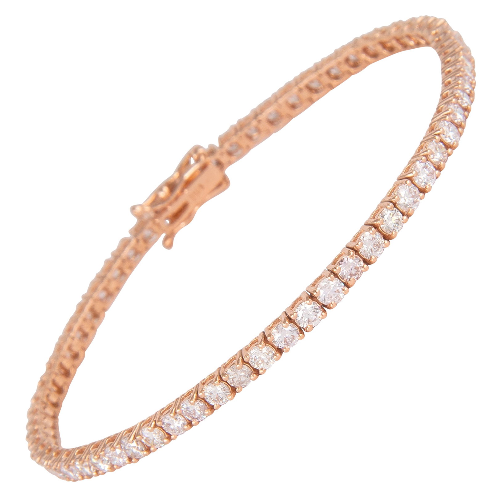 14k Rose Gold Diamond Tennis Bracelet 4.31ct: 14k Rose Gold Diamond Tennis Bracelet 4.31ct Diamond tennis bracelet set with 63 round brilliant diamonds totaling 4.31 ct in a four-prong 14k rose gold setting. This modern bracelet was made in 2022 