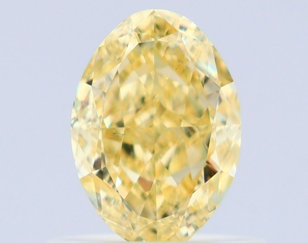 Loose Diamond - OVAL 0.65ct Fancy Yellow VS2: Loose Diamond - OVAL 0.65ct Fancy Yellow VS2 Source: Natural Shape: OVAL Carats: 0.65 Color: Fancy Yellow Certification: GIA Video: