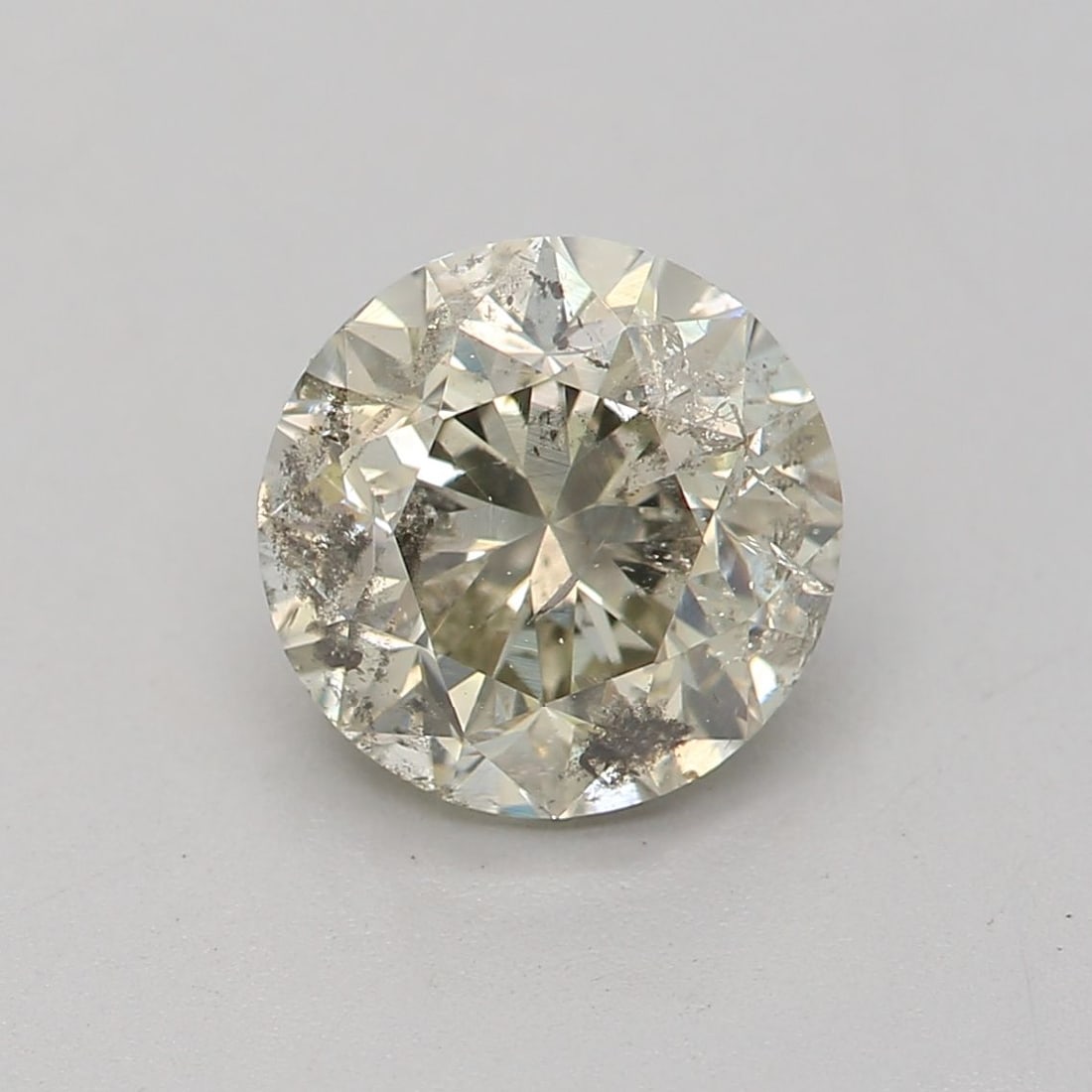 Loose Diamond - ROUND 1.06ct Q-R I2: Loose Diamond - ROUND 1.06ct Q-R I2 Source: Natural Shape: ROUND Carats: 1.06 Color: Q-R Certification: GIA Video: