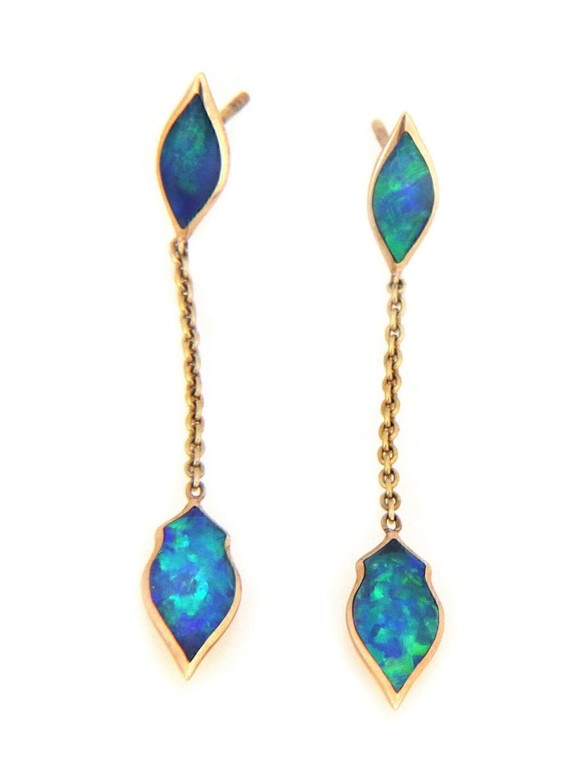 Kabana Leaf Motif Dangle Earrings 14k Yellow Gold Fire Opal: Kabana Leaf Motif Dangle Earrings 14k Yellow Gold Fire Opal Kabana leaf motif dangle earrings crafted in 14k yellow gold with natural fire opal inlay. The elongated leaf design offers graceful movemen