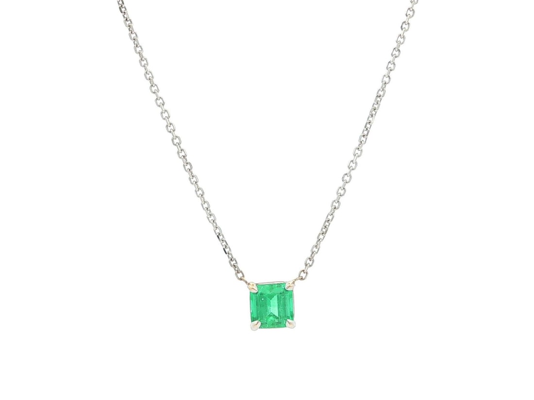 14k White Gold Emerald Pendant with Adjustable 16 or 18 Inch Chain: 14k White Gold Emerald Pendant with Adjustable 16 or 18 Inch Chain Un-used 14k white gold solitaire pendant necklace featuring one natural genuine Colombian emerald in a square cut with vibrant green 