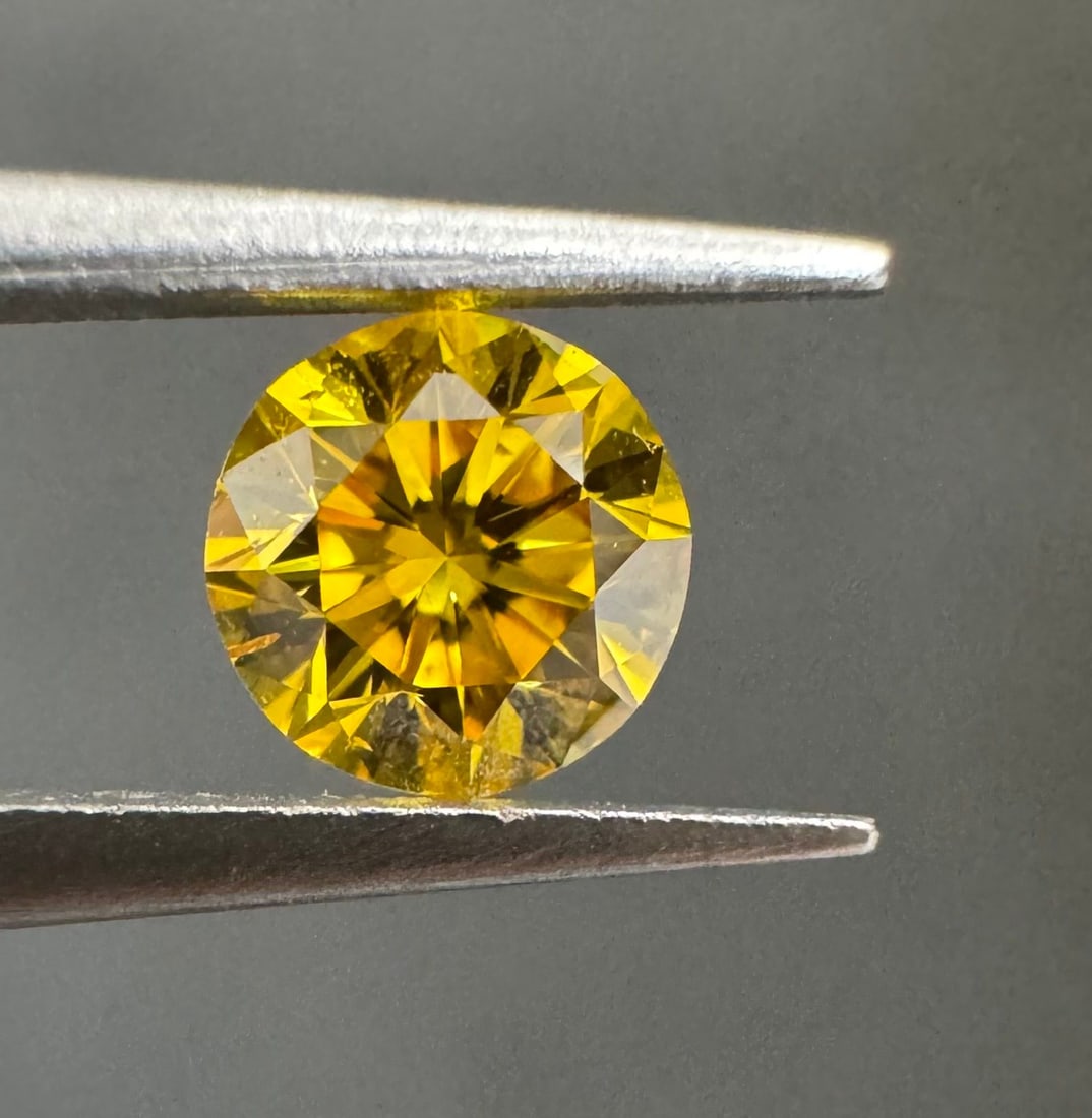 Loose Diamond - ROUND 0.21ct Fancy Vivid Orangey Yellow I1: Loose Diamond - ROUND 0.21ct Fancy Vivid Orangey Yellow I1 Source: Natural Shape: ROUND Carats: 0.21 Color: Fancy Vivid Orangey Yellow Certification: GIA PLEASE NOTE: Framed, Large, or heavy items do 