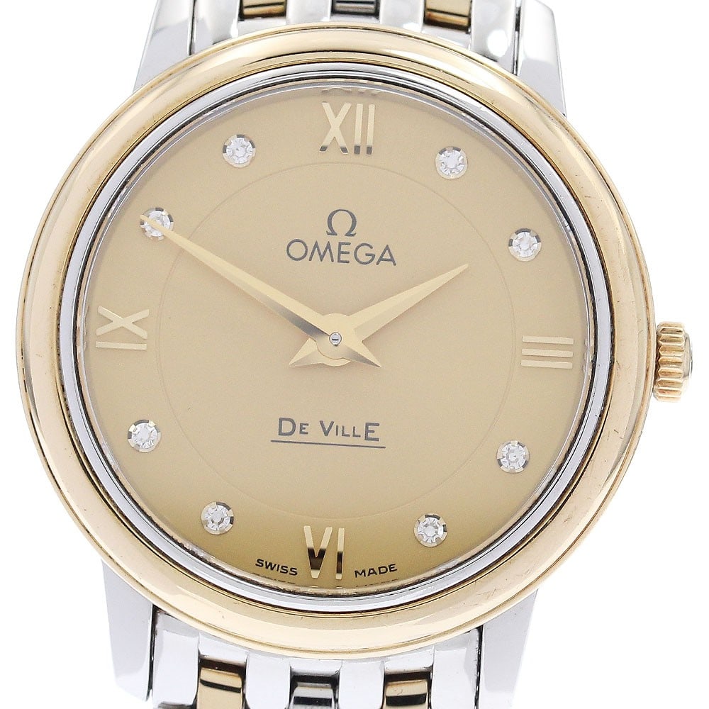 OMEGA De Ville Prestige 424.20.27.60.58.001 Ladies Quartz Diamond Watch: OMEGA De Ville Prestige 424.20.27.60.58.001 Ladies Quartz Diamond Watch OMEGA De Ville Prestige ladies wristwatch with a quartz movement and an 8P diamond gold dial. The watch features a stainless ste
