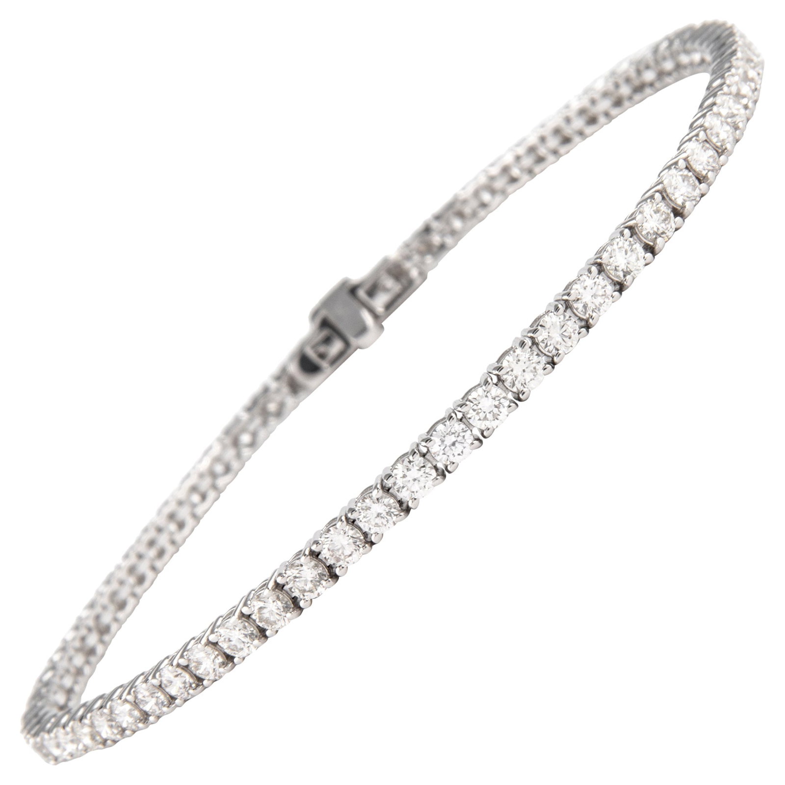 18k White Gold Diamond Tennis Bracelet 3.50ct: 18k White Gold Diamond Tennis Bracelet 3.50ct Diamond tennis bracelet set with 65 round brilliant diamonds totaling 3.50 ct in 18k white gold. The diamonds are approximately H/I color and VS clarity i