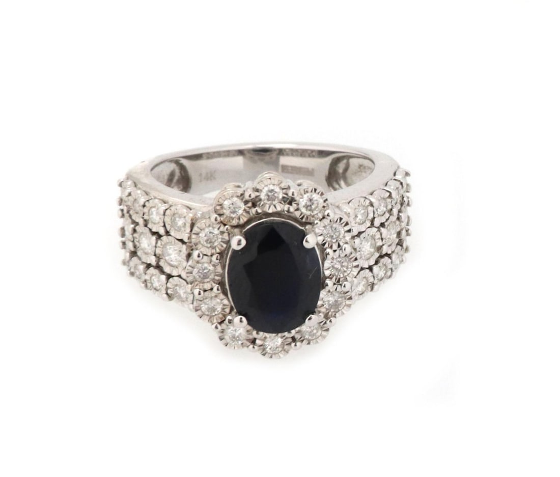 Effy 14k White Gold Sapphire Diamond Cocktail Ring Size 7: Effy 14k White Gold Sapphire Diamond Cocktail Ring Size 7 This exquisite cocktail ring, crafted by Effy, showcases a stunning oval dark blue sapphire at its center, weighing approximately 2 carats. Th