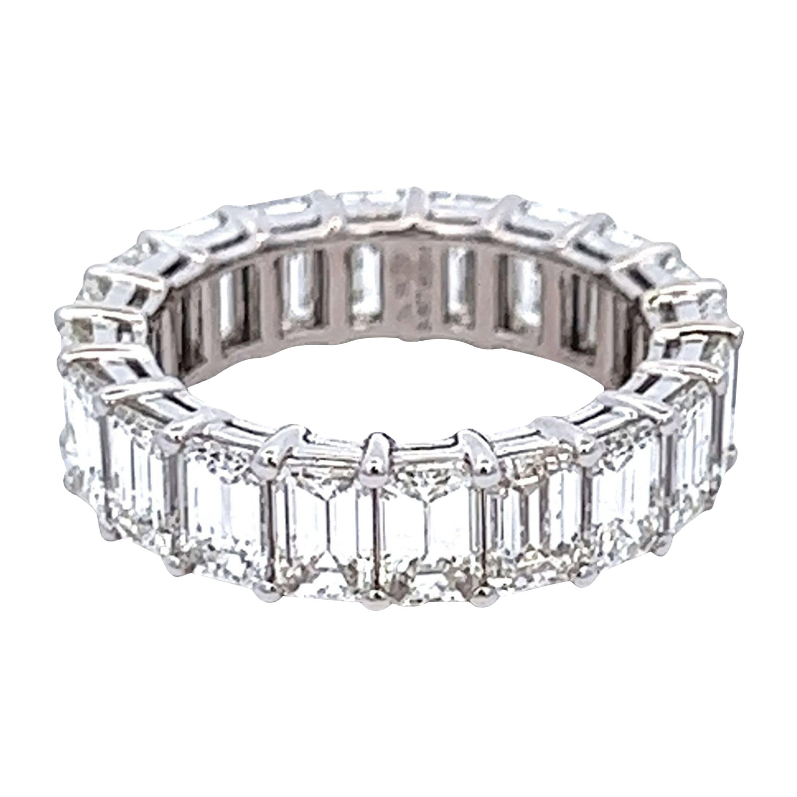 18k White Gold 6.36ct Diamond Eternity Ring Size 5.5: 18k White Gold 6.36ct Diamond Eternity Ring Size 5.5 Emerald cut diamond eternity band set with 20 diamonds totaling 6.36 carats. The diamonds are E/F color and VVS clarity in a 4-prong 18k white gold