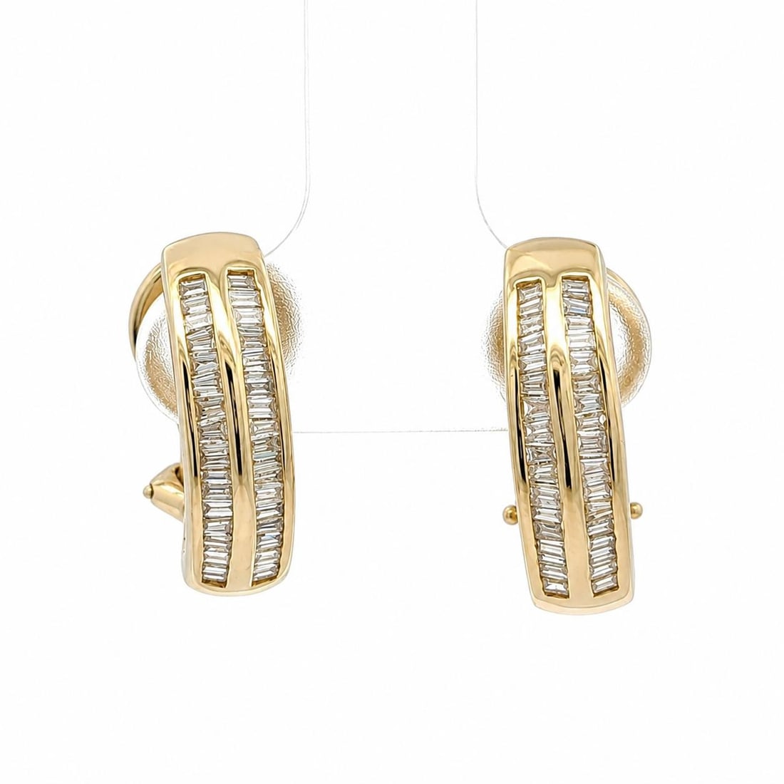 14k Yellow Gold Huggie Cuff Earrings with 0.50ctw Baguette Diamonds: 14k Yellow Gold Huggie Cuff Earrings with 0.50ctw Baguette Diamonds Pre-owned women's huggie cuff earrings crafted in solid 14K yellow gold and set with numerous natural baguette-cut diamonds in a cha