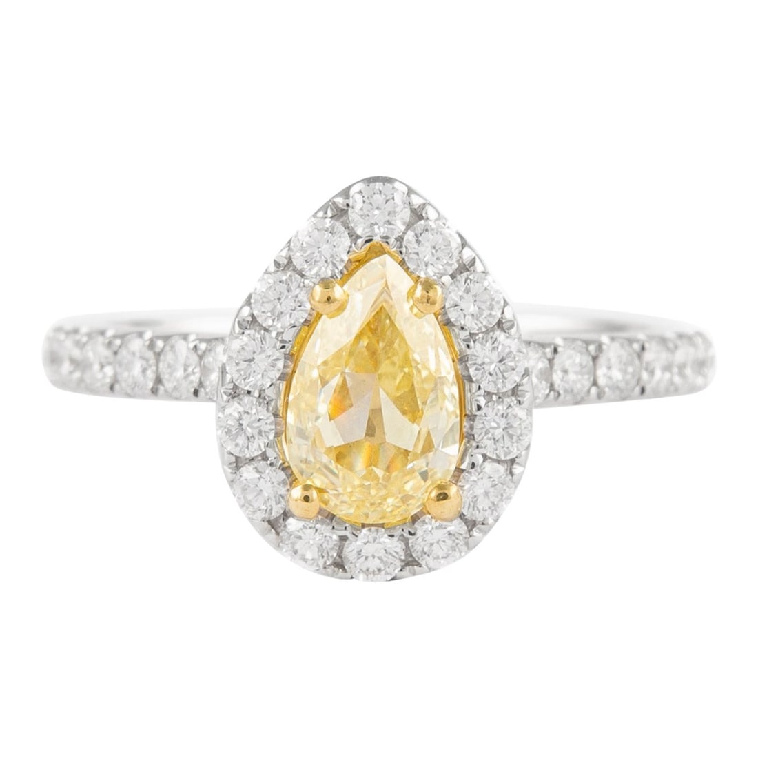 18k White Gold Halo Ring with 1ct GIA Fancy Yellow Pear Diamond: 18k White Gold Halo Ring with 1ct GIA Fancy Yellow Pear Diamond Contemporary halo ring featuring a GIA-graded 1.00 ct pear Fancy Yellow VS1 diamond accented by 28 round brilliant diamonds with a total