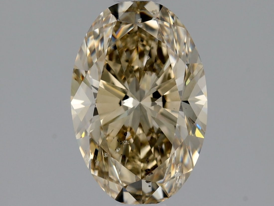 Loose Diamond - OVAL 1.01ct Fancy Light Brown Yellow SI2: Loose Diamond - OVAL 1.01ct Fancy Light Brown Yellow SI2 Source: Natural Shape: OVAL Carats: 1.01 Color: Fancy Light Brown Yellow Certification: GIA Video: