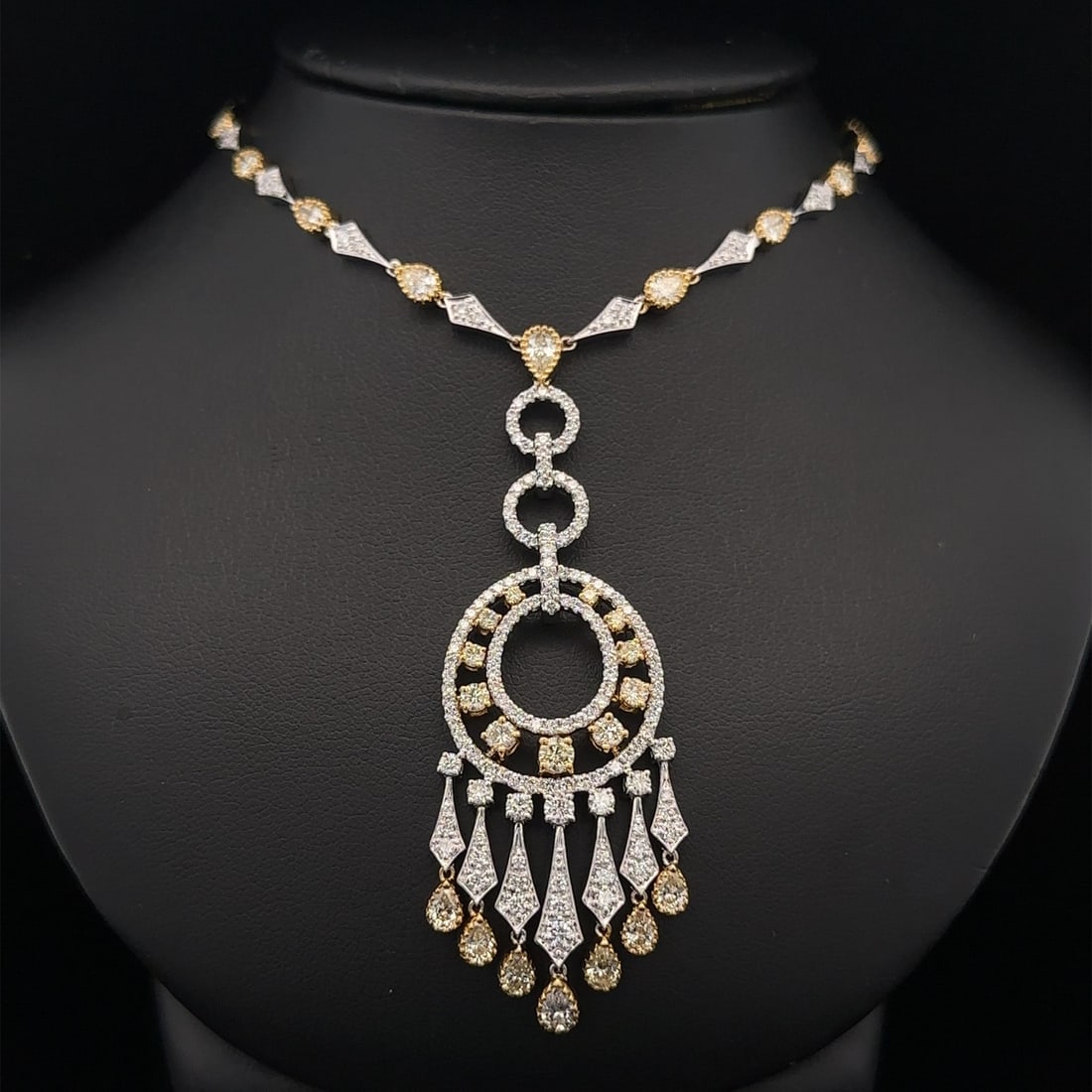 Stunning 18k Two Tone Gold 9ctw Yellow & White Diamond Chandelier Necklace: Stunning 18k Two Tone Gold 9ctw Yellow & White Diamond Chandelier Necklace This stunning 18k two-tone gold chandelier necklace features a captivating design adorned with a remarkable combination of ye