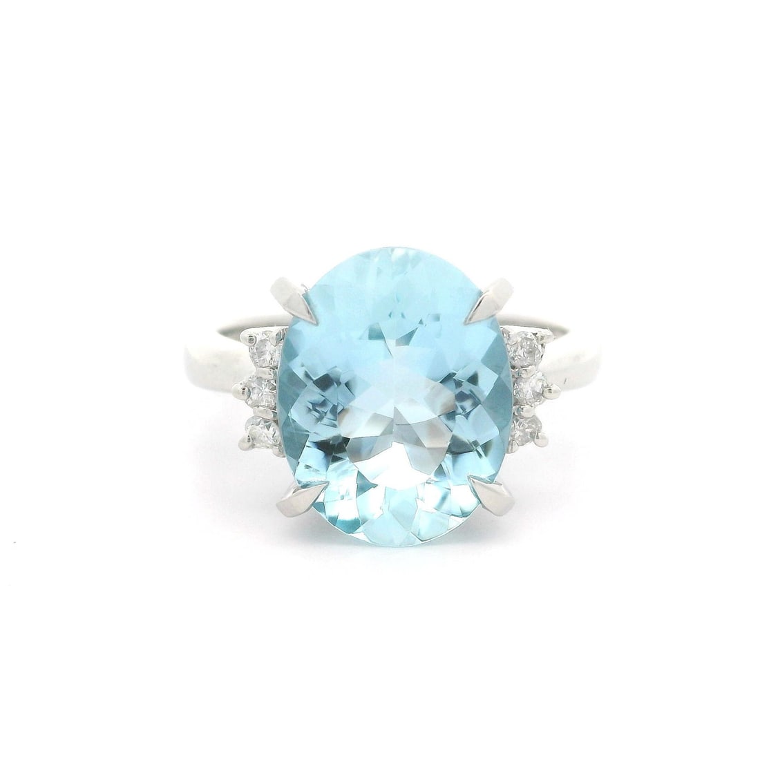 Platinum Cocktail Ring with Oval Aquamarine and Diamond Accents 3.96ctw: Platinum Cocktail Ring with Oval Aquamarine and Diamond Accents 3.96ctw Classic style cocktail ring crafted in solid platinum and set with a natural oval-cut aquamarine accented by round brilliant-cut