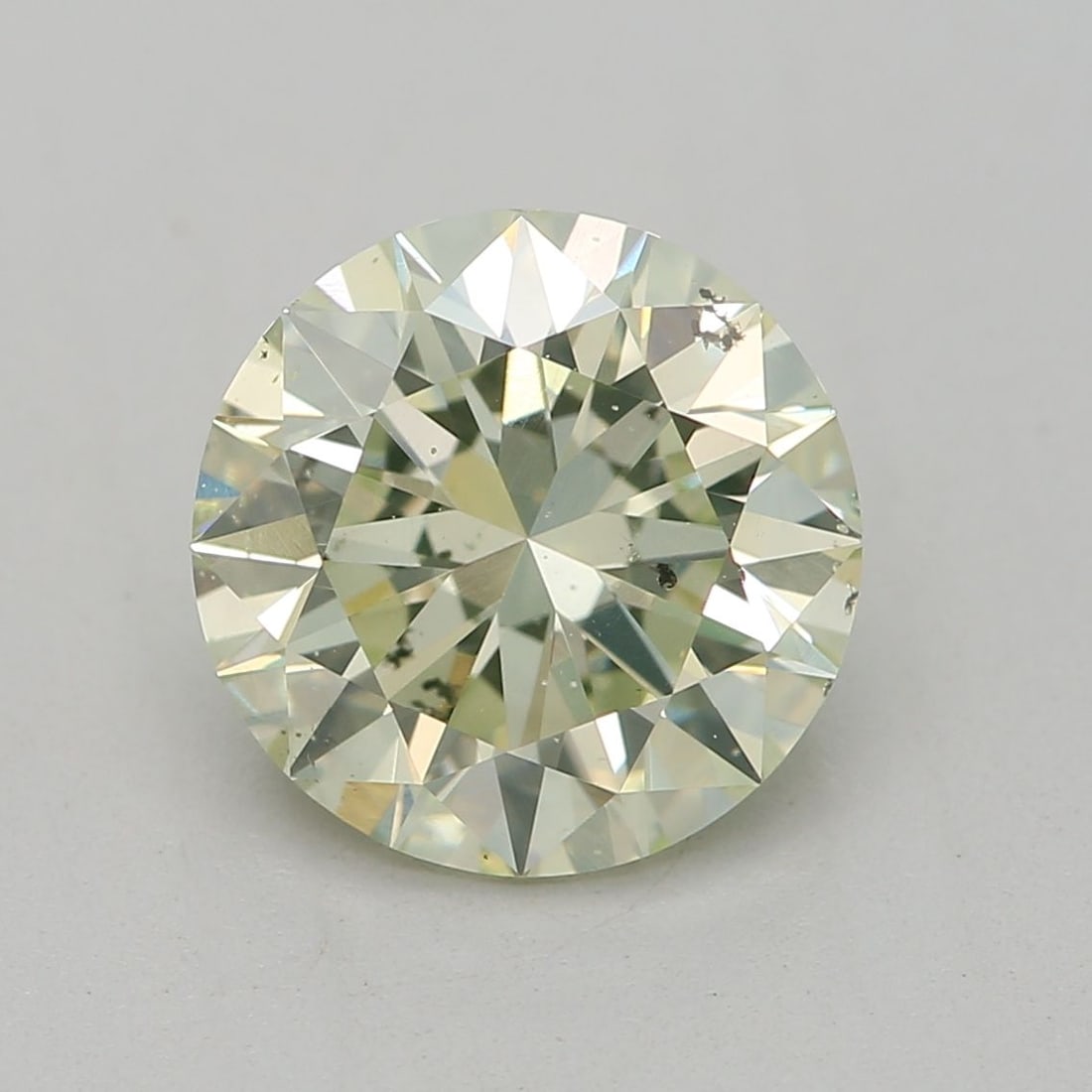 Loose Diamond - ROUND 1.14ct Fancy Light Yellow Green SI2: Loose Diamond - ROUND 1.14ct Fancy Light Yellow Green SI2 Source: Natural Shape: ROUND Carats: 1.14 Color: Fancy Light Yellow Green Certification: GIA Video: