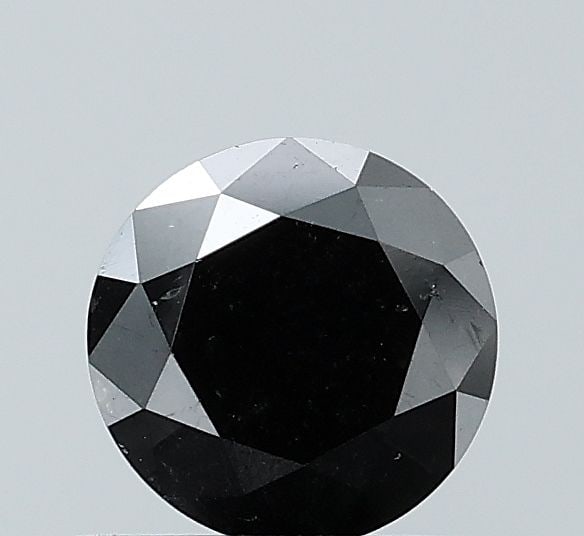 Loose Diamond - ROUND 0.73ct Fancy Black VS1: Loose Diamond - ROUND 0.73ct Fancy Black VS1 Source: Natural Shape: ROUND Carats: 0.73 Color: Fancy Black Certification: NONE Video: