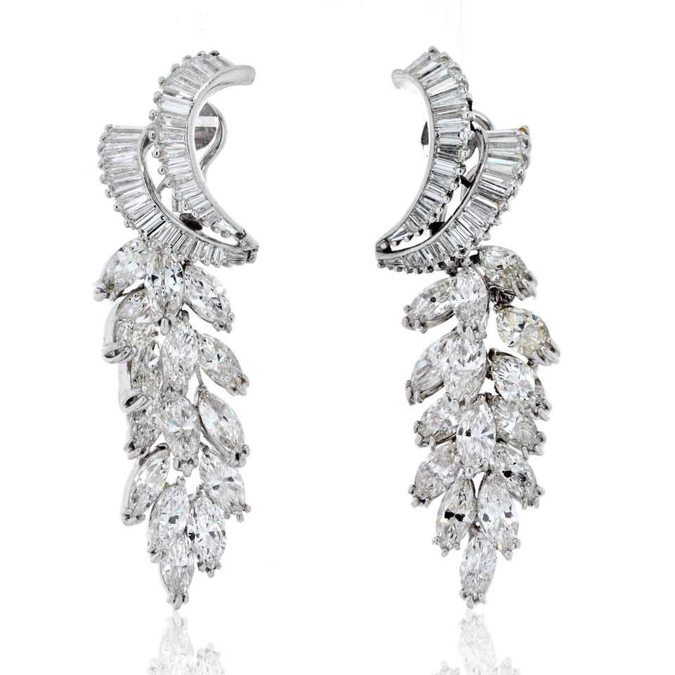 Platinum Diamond Drop Earrings 21 Cts Marquise and Baguette: Platinum Diamond Drop Earrings 21 Cts Marquise and Baguette Pre-owned platinum drop earrings featuring a spray design with marquise-cut and baguette diamonds. Designed for pierced ears, this pair offe