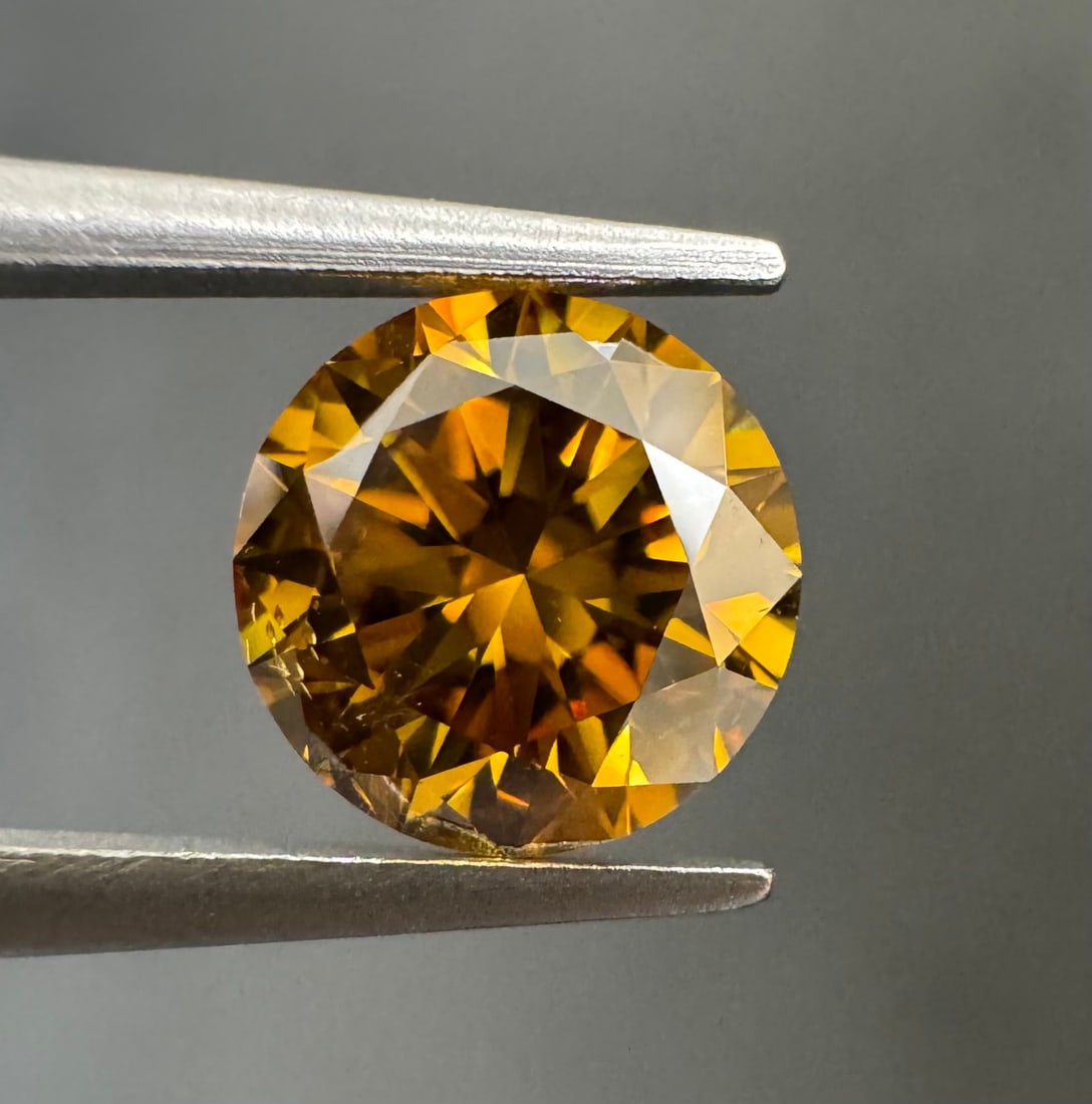 Loose Diamond - ROUND 1.0ct Fancy Deep Brownish Orangey Yellow SI2: Loose Diamond - ROUND 1.0ct Fancy Deep Brownish Orangey Yellow SI2 Source: Natural Shape: ROUND Carats: 1.0 Color: Fancy Deep Brownish Orangey Yellow Certification: GIA Video: