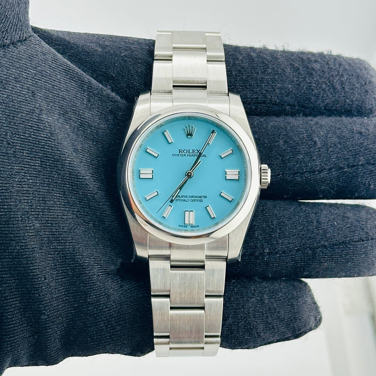 Rolex Oyster Perpetual 116000 mens watch aftermarket Tiffany dial card 2014: Rolex Oyster Perpetual 116000 mens watch aftermarket Tiffany dial card 2014 Rolex Oyster Perpetual reference 116000 with an Aftermarket Tiffany stick dial, smooth bezel, and Oyster bracelet. This men'