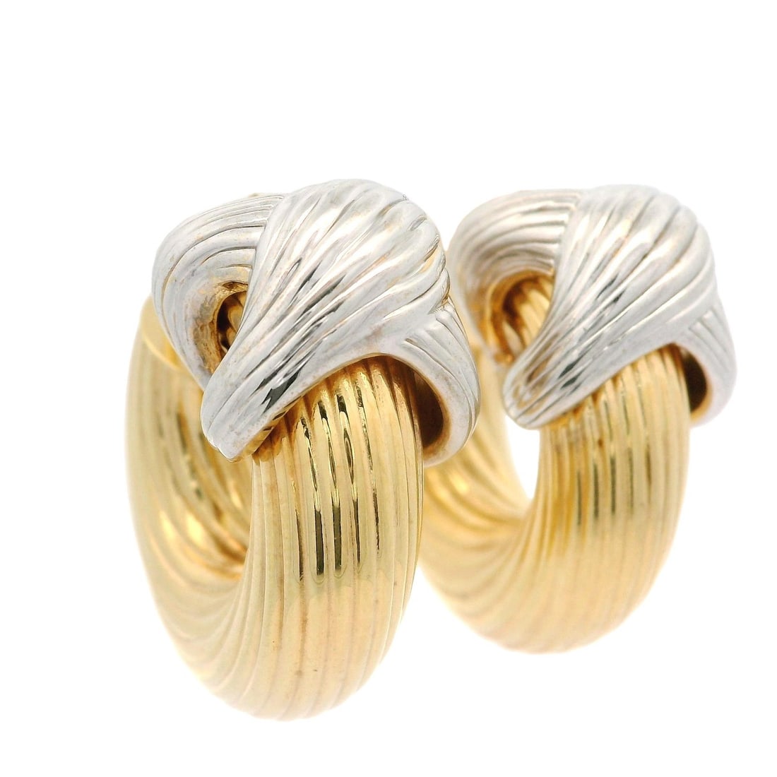 14K Italian Gold Hoop Earrings Textured Grooved X Motif Yellow White: 14K Italian Gold Hoop Earrings Textured Grooved X Motif Yellow White Italian-made 14k yellow and white gold hoop earrings with a textured, grooved X design. These pierced earrings feature a hollow des