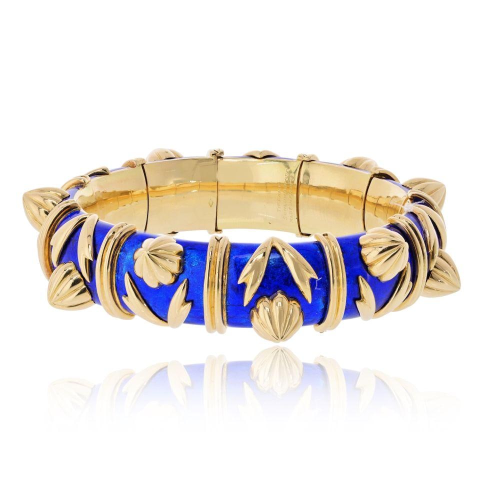 Tiffany & Co. Schlumberger Cones Bangle 18K Yellow Gold Blue Paillonne Enamel: Tiffany & Co. Schlumberger Cones Bangle 18K Yellow Gold Blue Paillonne Enamel Pre-owned Tiffany & Co. Schlumberger 'Cones' bangle bracelet crafted in 18K yellow gold with blue paillonne enamel. This s