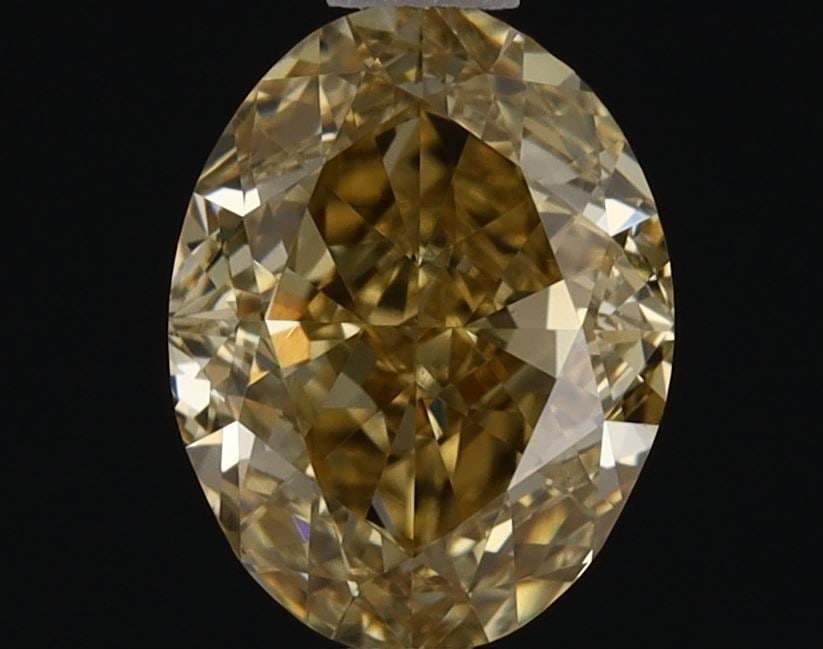 Loose Diamond - OVAL 0.9ct Fancy Brownish Yellow VS1: Loose Diamond - OVAL 0.9ct Fancy Brownish Yellow VS1 Source: Natural Shape: OVAL Carats: 0.9 Color: Fancy Brownish Yellow Certification: GIA Video: