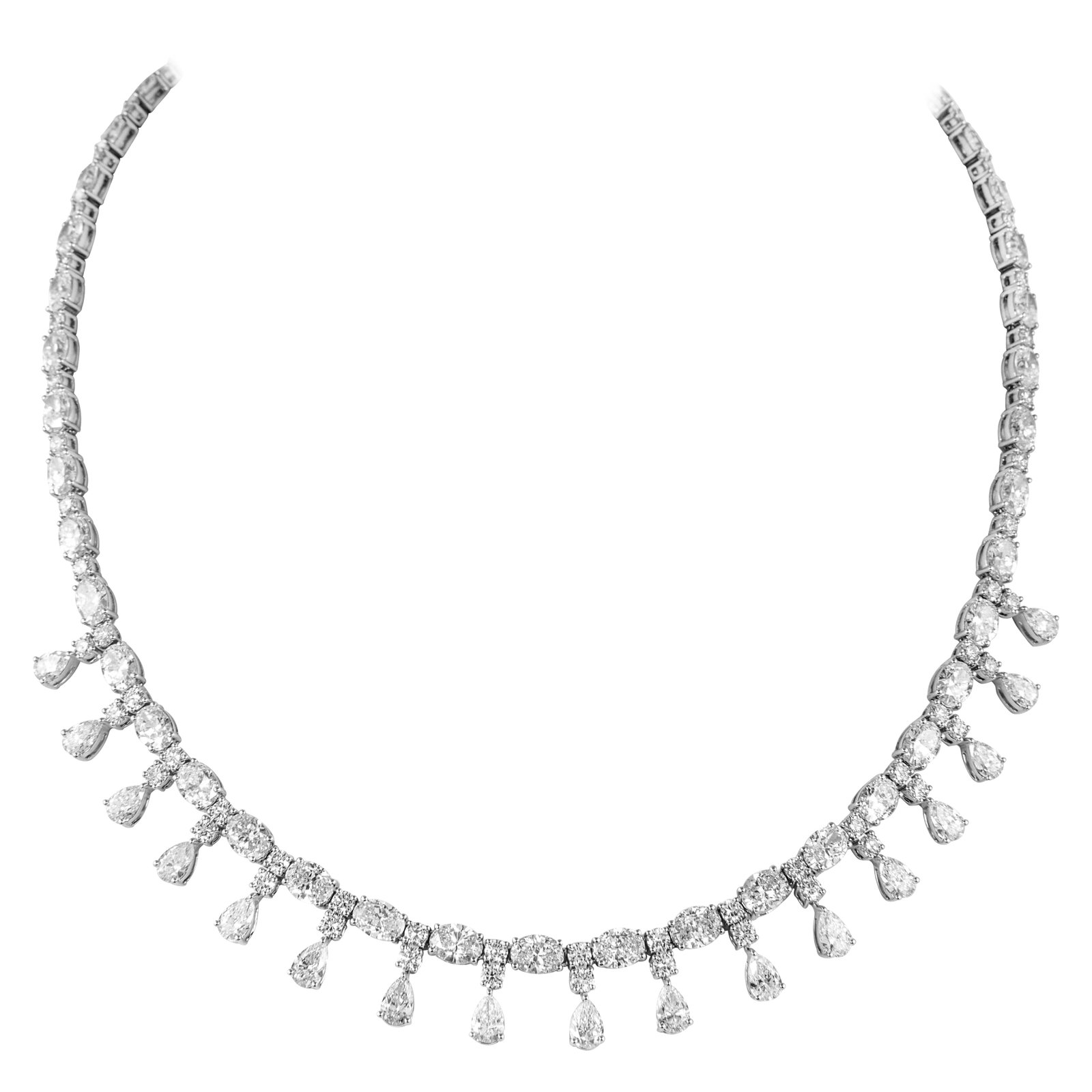 28.12ct Diamond Drop Necklace in 18k White Gold: 28.12ct Diamond Drop Necklace in 18k White Gold Grand multi-diamond necklace set with natural oval, pear shape, and round brilliant diamonds in 18k white gold. This contemporary drop necklace has a to