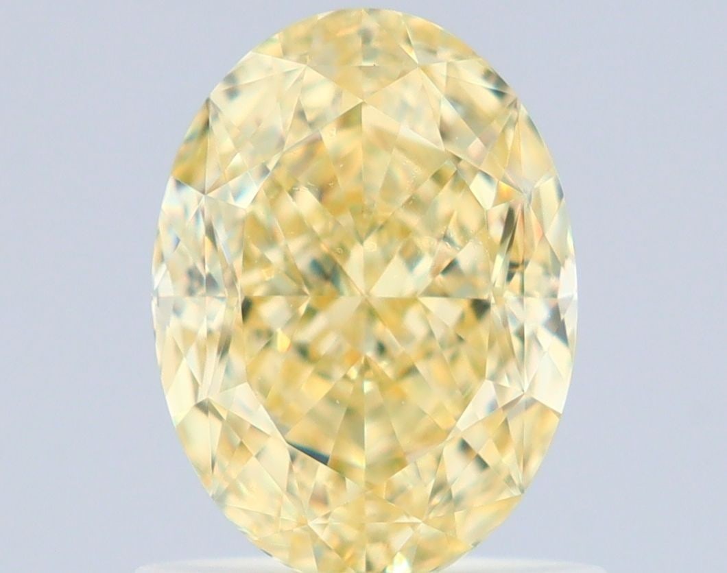 Loose Diamond - OVAL 1.09ct Fancy Yellow VVS2: Loose Diamond - OVAL 1.09ct Fancy Yellow VVS2 Source: Natural Shape: OVAL Carats: 1.09 Color: Fancy Yellow Certification: GIA Video: