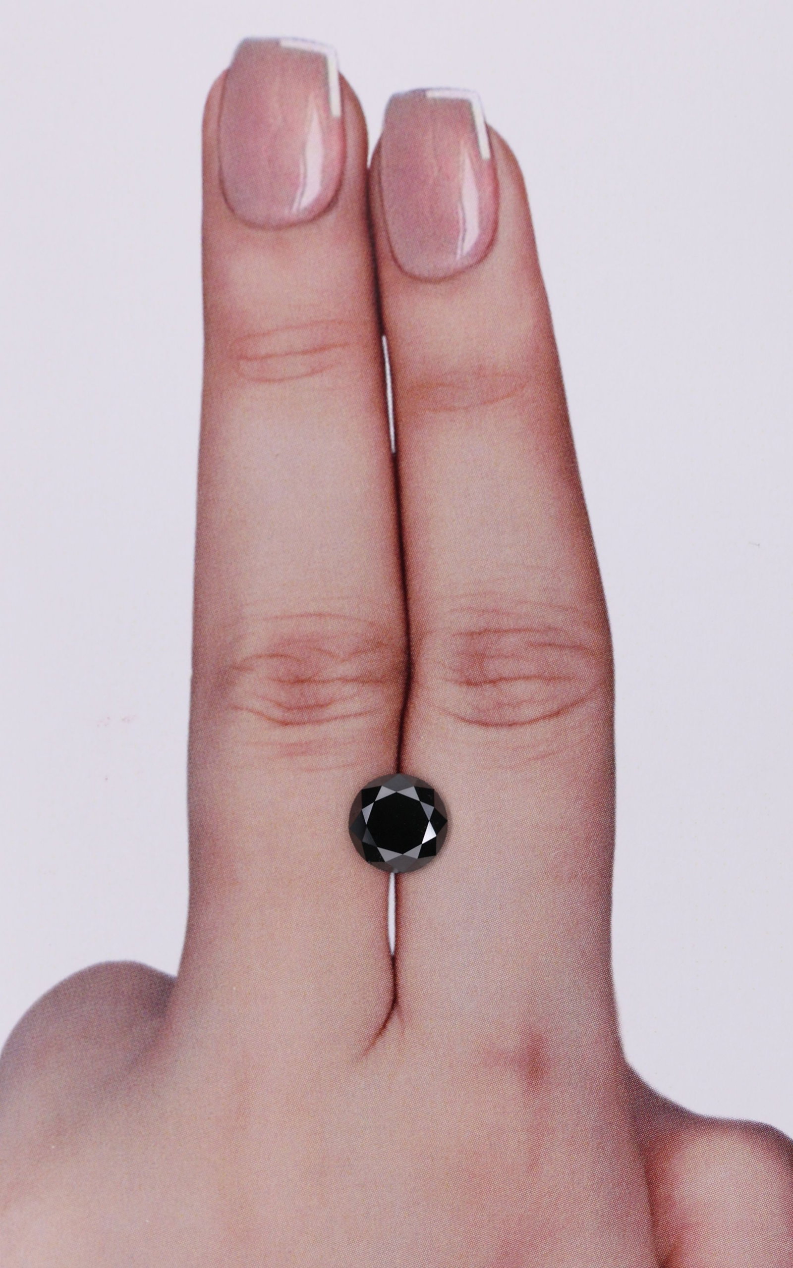 Loose Diamond - ROUND 1.61ct Black: Loose Diamond - ROUND 1.61ct Black Source: Natural Shape: ROUND Carats: 1.61 Color: Black Certification: IGI Video:
