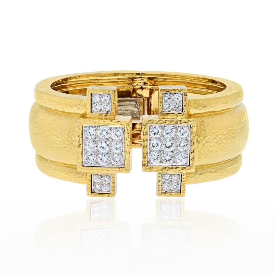 David Webb diamond clamper cuff bracelet in 18K yellow gold and platinum: David Webb diamond clamper cuff bracelet in 18K yellow gold and platinum Pre-owned David Webb wide cuff bracelet featuring a hammered 18K yellow gold clamper design with round brilliant cut diamonds p