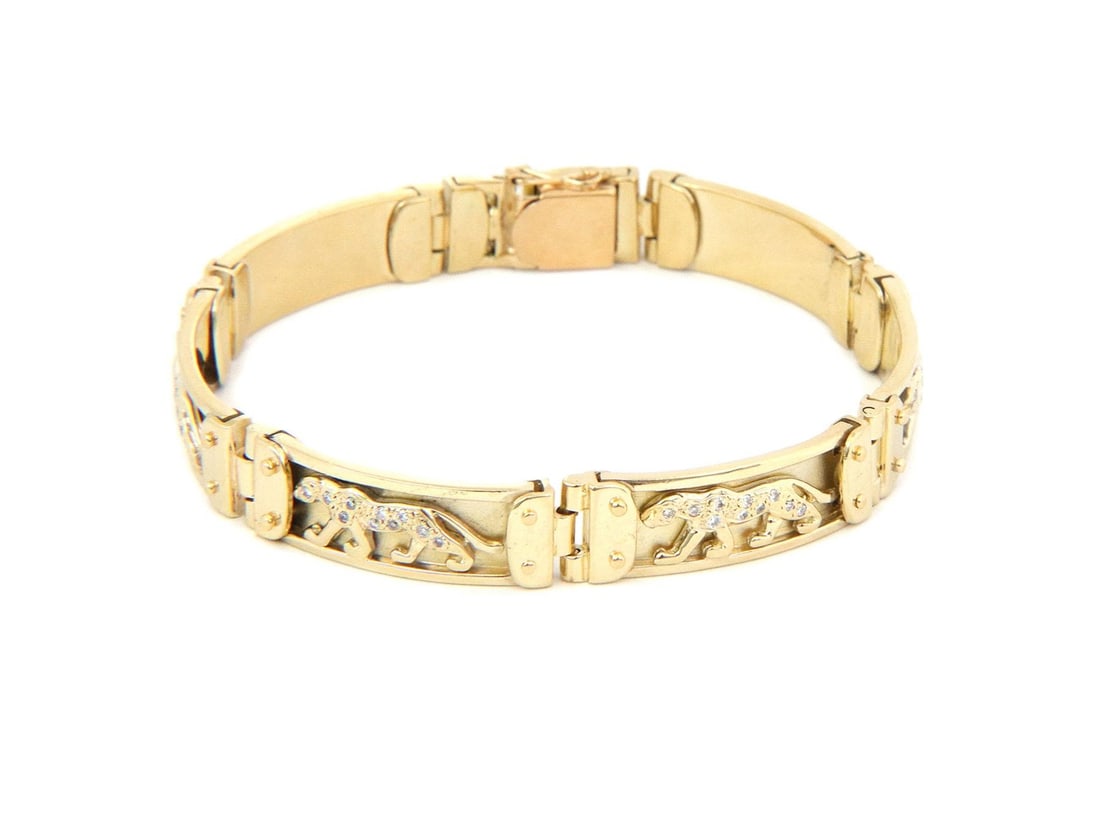 14k Yellow Gold Panther Bracelet with Diamonds 8.5 Inch Bold Design: 14k Yellow Gold Panther Bracelet with Diamonds 8.5 Inch Bold Design This striking bracelet is expertly crafted from 14k yellow gold, featuring a unique combination of polished and matte finishes. It s