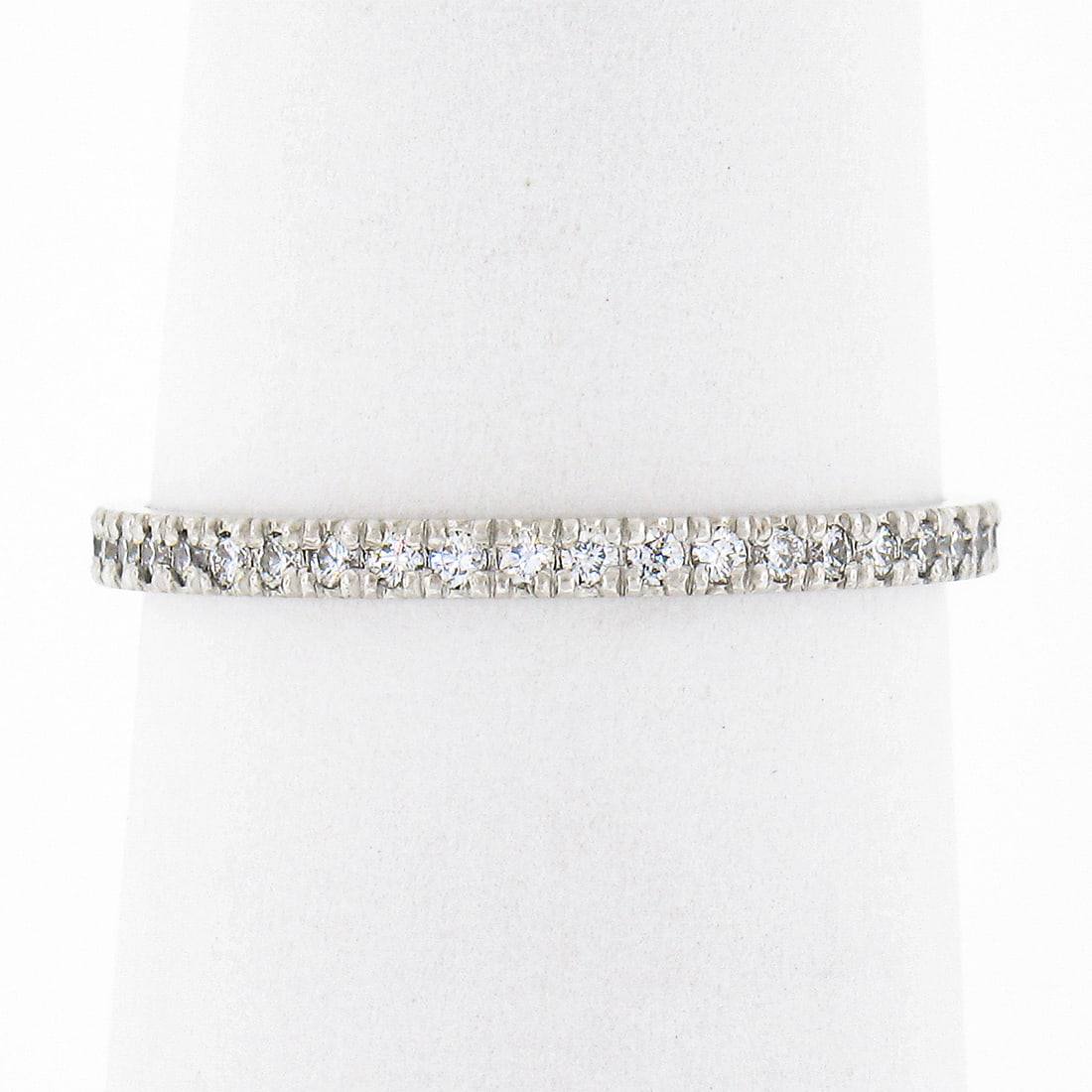 18k White Gold Eternity Band Ring 0.25ct Diamond Size 6: 18k White Gold Eternity Band Ring 0.25ct Diamond Size 6 Pre-owned eternity band ring crafted in solid 18k white gold and set with natural round brilliant diamonds in a prong setting. This thin petite 