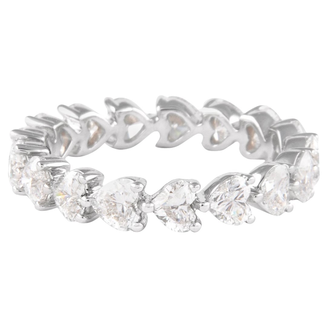 18k White Gold Heart Diamond Eternity Ring 2.50ct: 18k White Gold Heart Diamond Eternity Ring 2.50ct Heart diamond eternity band featuring 17 diamonds totaling 2.50 ct, with D/E color and VVS clarity, set in 18k white gold. This modern ring is un-used