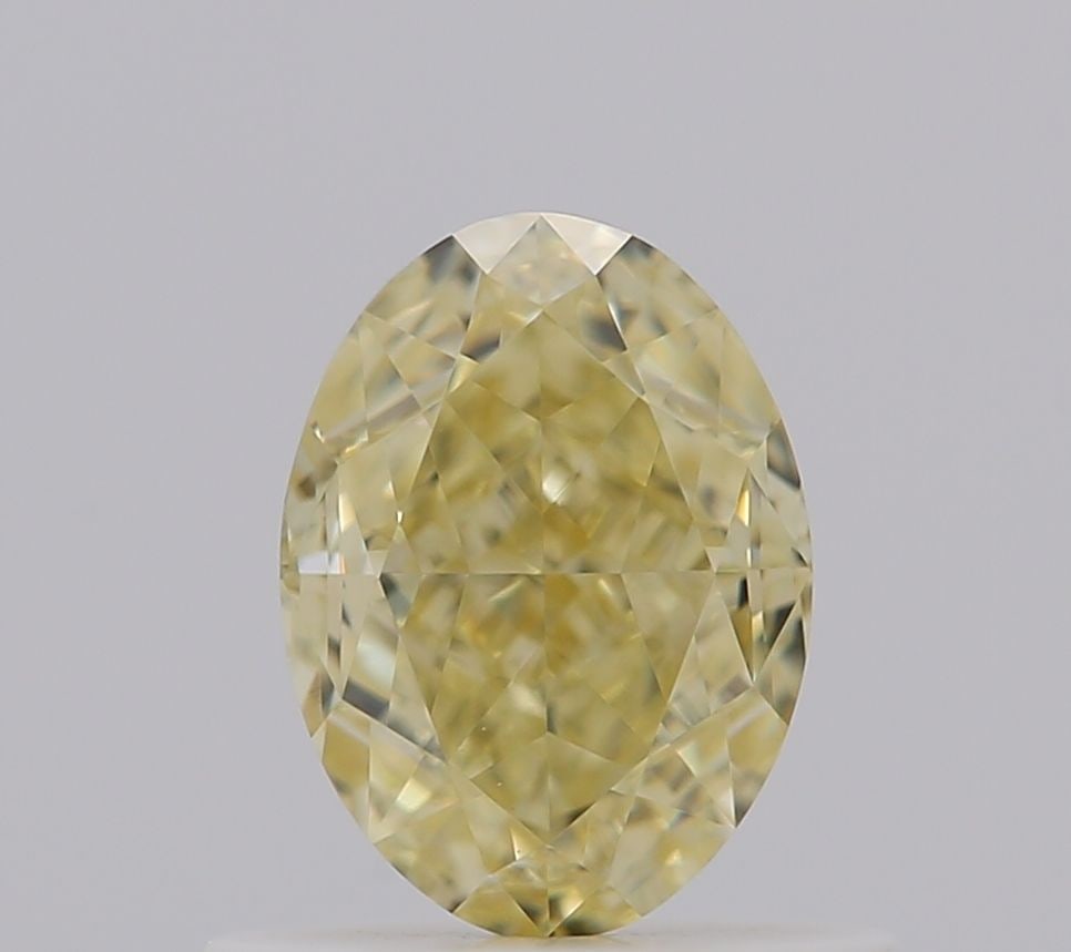 Loose Diamond - OVAL 0.73ct Fancy Yellow VS1: Loose Diamond - OVAL 0.73ct Fancy Yellow VS1 Source: Natural Shape: OVAL Carats: 0.73 Color: Fancy Yellow Certification: GIA Video: