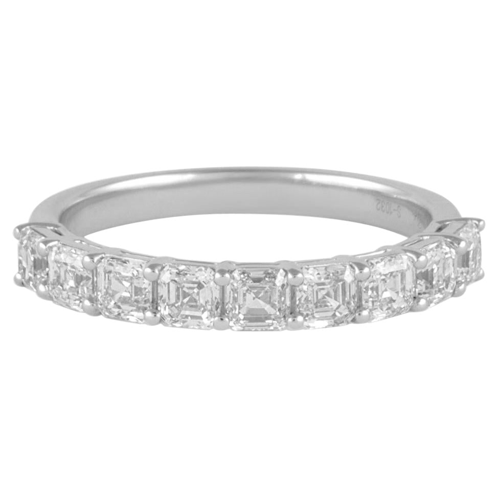 18k White Gold Half Eternity Ring 1.26ct Asscher Diamonds: 18k White Gold Half Eternity Ring 1.26ct Asscher Diamonds Contemporary half eternity band set with 10 Asscher cut white diamonds totaling 1.26 ct. Crafted in 18k white gold, this ring is size 6.25 US 