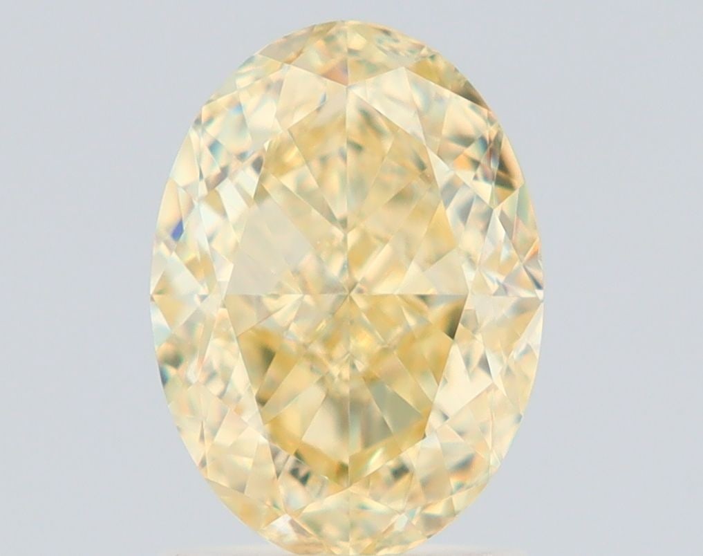 Loose Diamond - OVAL 2.01ct Fancy Light Yellow VS2: Loose Diamond - OVAL 2.01ct Fancy Light Yellow VS2 Source: Natural Shape: OVAL Carats: 2.01 Color: Fancy Light Yellow Certification: GIA Video: Video Link PLEASE NOTE: Framed, Large, or heavy items